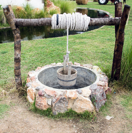 Water Well with Wooden Bucketの写真素材