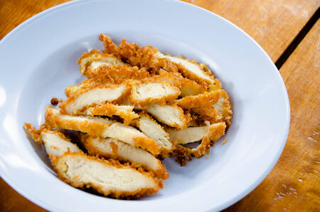sliced Fried Chicken on blue plate