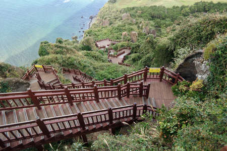Seongsan Ilchulbong in Jeju-do Korea 
Seongsan Ilchulbong, also called âSunrise Peakâ, is an archetypal tuff cone formed by hydrovolcanic eruptions upon a shallow seabed about 5 thousand years agoの写真素材