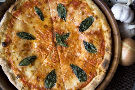 tasty pizza and ingredient on top viewの写真素材