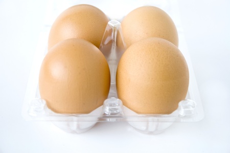 eggs in clear pack on white background
