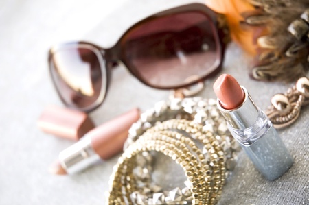 pink lipstick beauty concept with accessories backgroundの写真素材