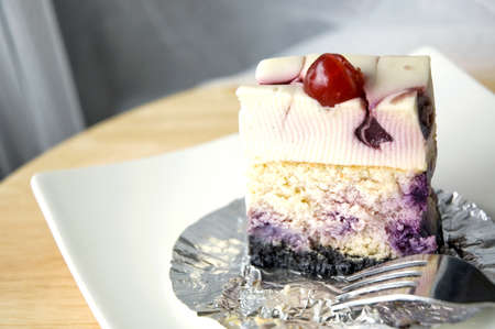 close up a piece of blueberry cheesecake