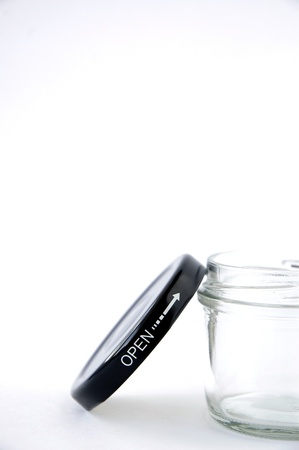 open glass bottle on white backgroundの写真素材