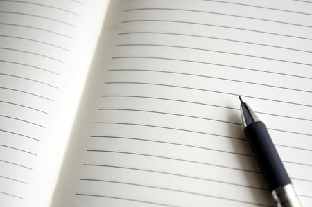 open blank pages of notebook with penの写真素材