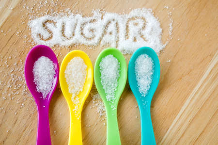 text sugar with colorful spoonの写真素材