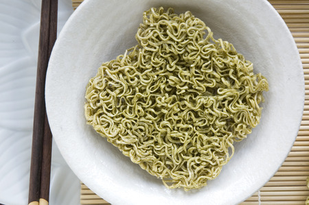 vegetable instant noodle uncooked in bowlの写真素材