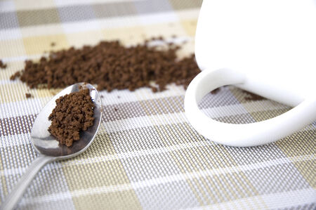 close up instant coffee in spoonの写真素材