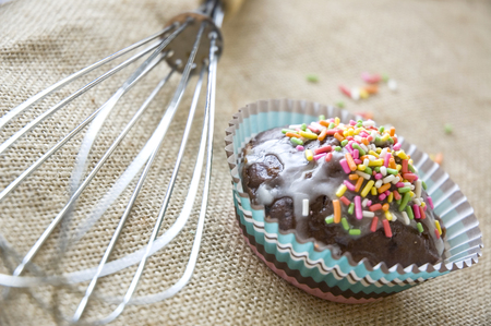 homemade cupcake with egg whiskの写真素材