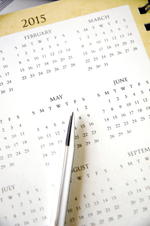 pen point to international worker day on calendarの写真素材