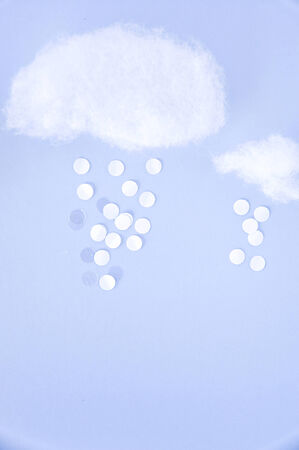 cotton and paper cut in cloud and snow shapeの写真素材