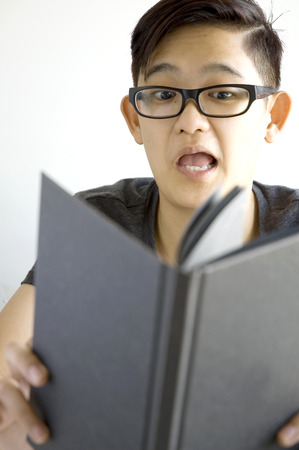 young asian found some secret in black book