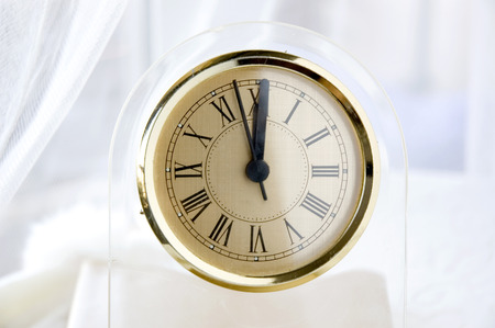 vintage style clock show at noon time