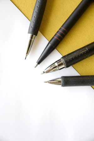 four black pen on white paperの写真素材
