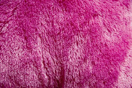 pink furry fabric backgroundの写真素材