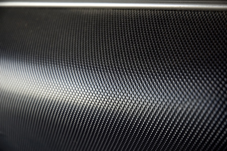 close up lighting on texture of black luggageの写真素材