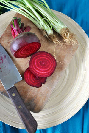 Above of fresh beetroot cutting on wooden board
