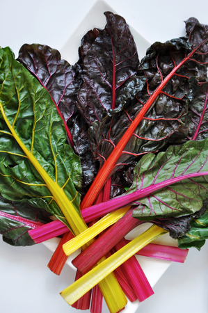 Above of fresh colorful Swiss Chard on white backgroundの写真素材