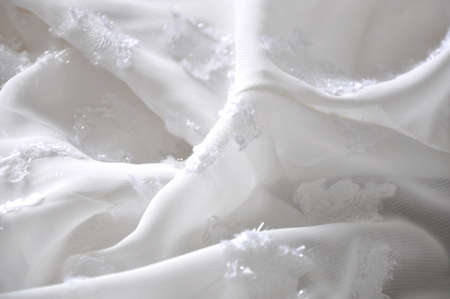 Close up white chiffon fabric texture backgroundの写真素材