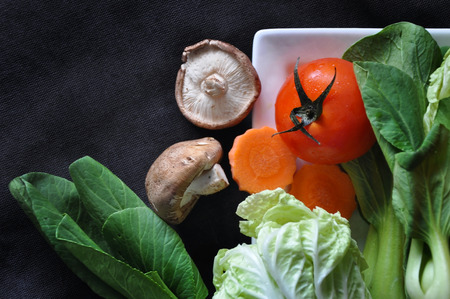 Top view of various fresh vegetable on dark backgroundの写真素材