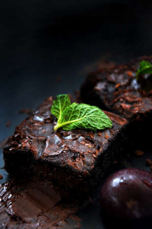 Close up fudge brownie bar on dark background with copy spaceの写真素材