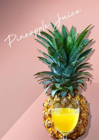 Pineapple juice glass and fresh pineapple on pastel pink background with wording pineapple juiceの写真素材