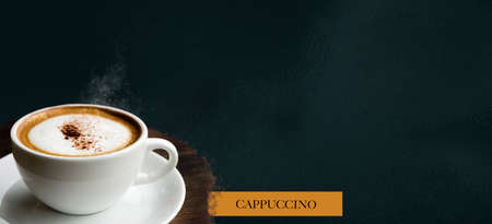 Hot Cappucino on drak green background with space for text in banner image sizeの写真素材