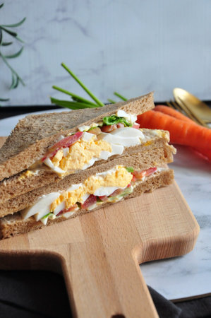 Close up healthy egg sandwich serve on wooden boardの写真素材
