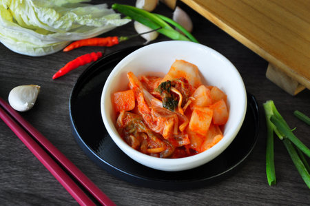 Healthy food Korean Kimchi bowl and fresh ingredients on backgroundの写真素材