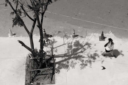 PHUKET, THAILAND FEBRUARY 15 2013: A tourist in the parking area of Big Buddha Park walks up Nakkerd Hill to the top of the monument. のeditorial素材