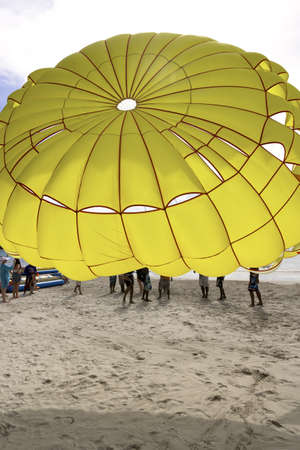 PATONG BEACH, PHUKET, THAILAND AUGUST 23 2011: Open parasail canopy on beach in Thailandのeditorial素材