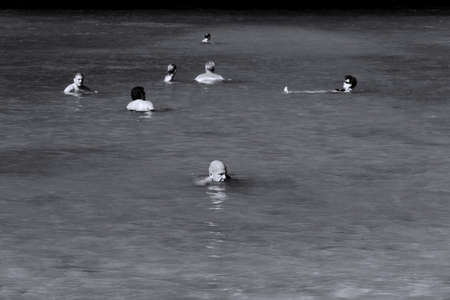 PARADISE BEACH, PHUKET, THAILAND JANUARY 28 2013: Tourists catch some rays for a tan while going for a swim at Paradise Beach during high season in Phuket.のeditorial素材