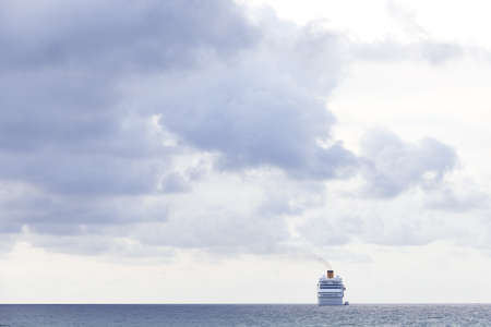 PATONG BEACH,  PHUKET, THAILAND NOVEMBER 16 2012: A cruise liner sits at anchor on the horizon off Patong Beach in southern Thailandのeditorial素材