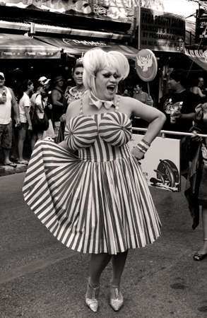 PATONG BEACH, PHUKET, THAILAND, 26 FEBRUARY 2011: A female impersonator participates in the annual Patong Gay Pride Parade.のeditorial素材