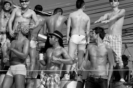 PATONG, PHUKET, THAILAND, 26 FEBRUARY 2011: A group of gay men dance on a parade float during the annual Patong Gay Pride Parade.のeditorial素材
