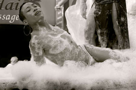 PATONG, PHUKET, THAILAND, 26 FEBRUARY 2011: A gay man on a parade float takes part in the annual Patong Gay Pride Parade.のeditorial素材