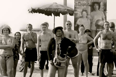 PATONG, PHUKET, THAILAND, 26 FEBRUARY 2011: Residents and tourists alike line the street to watch the annual Patong Gay Pride Parade.のeditorial素材