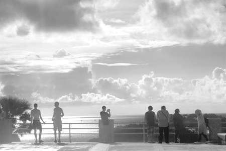 CAPE PROMTHEP, THE TIP OF PHUKET ISLAND, THAILAND, 17 AUGUST 2014: Group of tourists visit Cape...