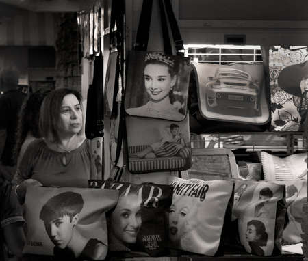 JUNG CEYLON MALL, PHUKET, THAILAND, 5 DECEMBER 2013: A woman goes souvenir hunting at an indoor mall in Thailand during the Xmas rush.のeditorial素材