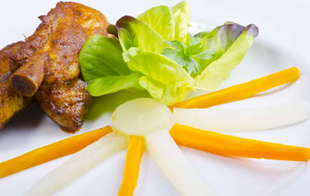 Grilled spareribs with honey inlaidly with fresh salad and vegetablesの写真素材