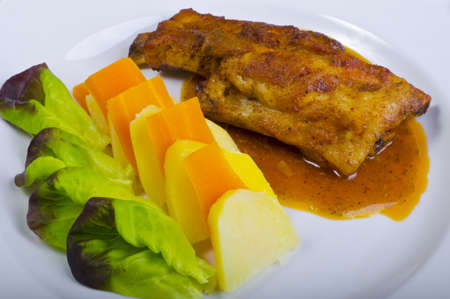 Grilled spareribs with honey inlaidly with fresh salad and vegetablesの写真素材