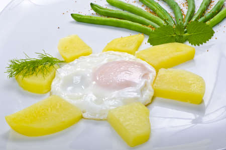 French beans as addition vegetables together with some Parmesan and eggsの写真素材