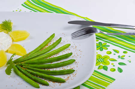 French beans as addition vegetables together with some Parmesan and eggsの写真素材