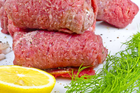 Rouladen  are a German meat roulade usually consisting of bacon, onions, mustard and pickles wrapped...