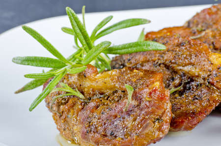 Fresh grilled cervical chop with herbsの写真素材