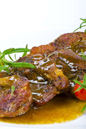 Fresh grilled cervical chop with herbsの写真素材