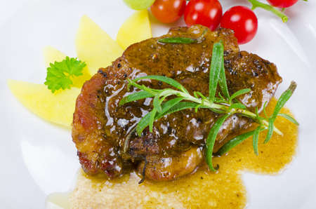 Fresh grilled cervical chop with herbsの写真素材