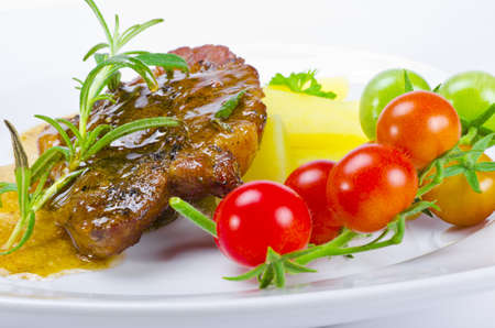Fresh grilled cervical chop with herbsの写真素材