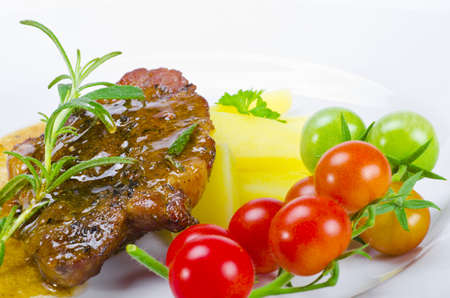 Fresh grilled cervical chop with herbsの写真素材
