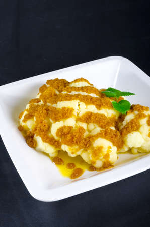 fresh cauliflower with butter and breadcrumbsの写真素材